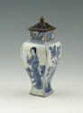Blue and white porcelain vase with standing woman, square base, and metal lid