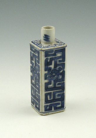 Blue and white porcelain bottle with square base, abstract design