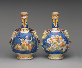 Two flasks with ram heads and mythological scenes in a blue seascape