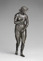 Alternate view of a bronze sculpture of a naked female figure. Her face has a look of shock on …