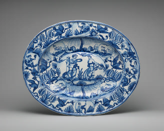 Oval platter with figurative decoration in blue and white