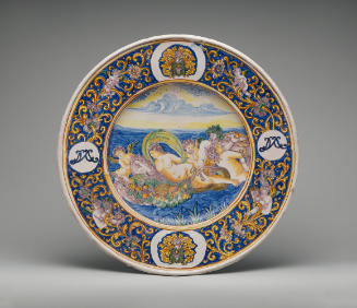 Circular plate with a mythological scene and ornate border, in color
