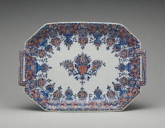 Eight-sided elongated platter with ornate floral decoration in blue and red