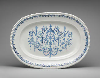 Large oval platter with ornate decoration in blue and white
