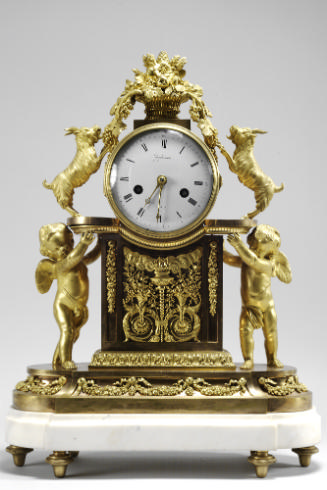 Frontal view of Mantel Clock in gilt bronze and marble with Attributes of Ceres, Venus, and Bac…