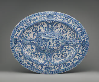 Large, oval platter covered with ornate decoration in blue and white