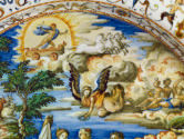 Detail of top half of the dish: Apollo on his chariot flying in the skies above an angel