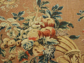 Detail of fruit and leaves in the tapestry on a Canapé: Part of a Set of Two Canapés, Eight Arm…