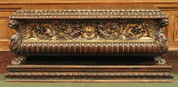 Front view of Chest with emblem, large acanthus rinceaux and parcel Gilding