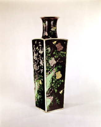Square porcelain vase with black ground and floral and vegetal designs