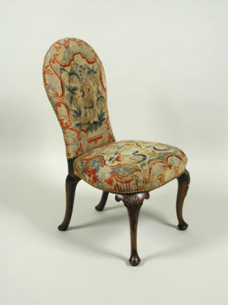 Chair with needlepoint upholstery showing armored female figure, with vegetal decoration, birds…