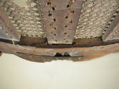 Detail of initials 'RD' beneath woven seat