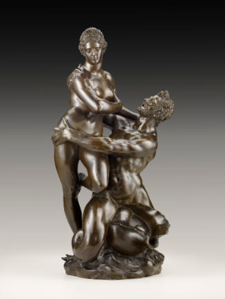 Bronze sculpture of Triton and Nereid.  Triton is straddling a conch shell and looking up to hi…