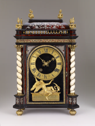 Front view of Mantel Clock, consisting of a luxurious mix of materials, including a gilt bronze…