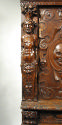 Detail of carved figural decoration from cabinet 