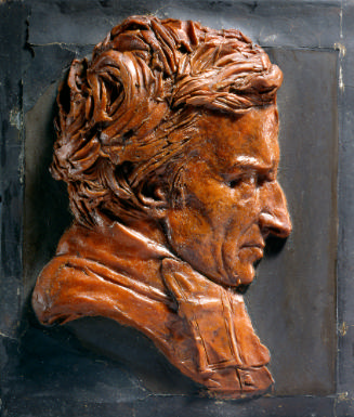 Wax relief carving of the bust of a man, facing to the right