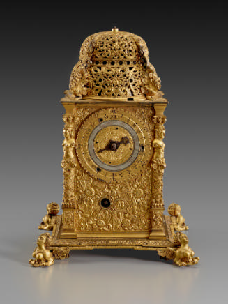 Front view of Tower Table Clock with intricate gilt-bronze decoration including four sphinges a…
