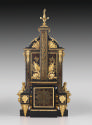 Reverse side of clock showing gilt bronze military trophies and elements offset by elaborate de…