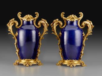Pair of blue hard-paste porcelain and gilt bronze mounted vases