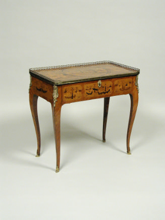 Small rectangular tulipwood table with marquetry scenes of houses and rivers around the apron