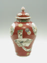Alternate view of porcelain covered jar with famille rose decoration