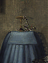 Close up of the metal object in the background of the oil painting