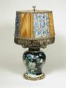 Porcelain covered jar with patterned lamp shade