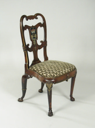 Walnut frame chair with crest and upholstered seat