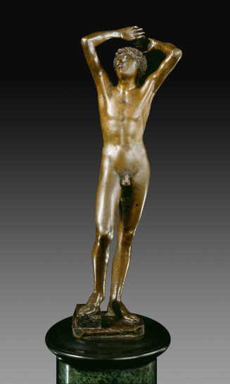 Bronze sculpture of a naked youth with raised arms.