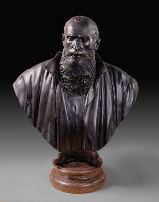 A bronze bust of a jurist.  He looks out slightly to his right, his hair is thinning at the top…
