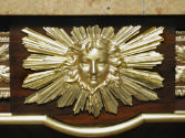 Side Table with Quartered Veneer, detail of gilt bronze mask
