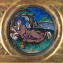 Round medallion with figure reading under a starry sky
