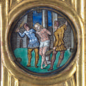 Round medallion with Christ being whipped and tied to a pole