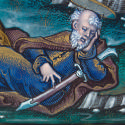 Detail of man sleeping with sword