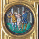 Round enamel medallion with Chris flayed by two men