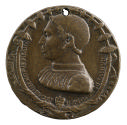 Bronze portrait medal of Filippo de' Medici in profile to the left, surrounded by a ring of flo…