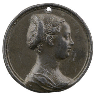 Lead portrait medal of a young woman with her hair coiled in a bun in profile to the right