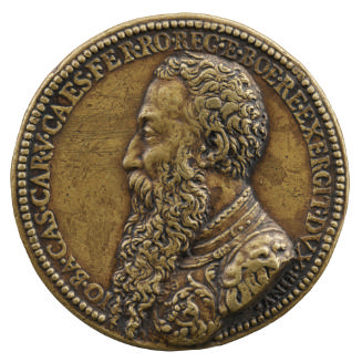 Bronze portrait medal of Giovanni Battista Castaldo wearing armor with a long, curly beard, in …