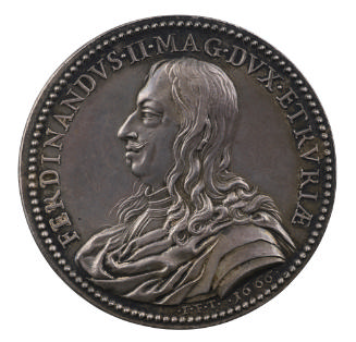 Silver portrait medal of Ferdinando II de' Medici wearing armor, with drapery around his should…