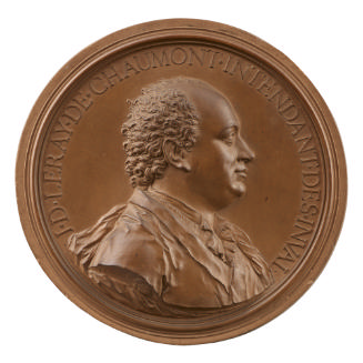 Terracotta medal of man in profile to the right