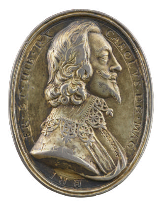 Silver portrait medal of Charles I of England hair loose and curling by his neck, wearing a fal…