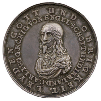 Silver portrait medal of King Charles I in armor, wearing a falling collar, jewel, and drapery …