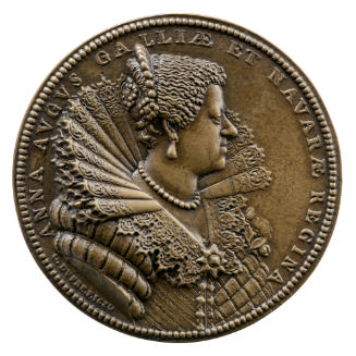 Bronze portrait medal of Anne of Austria hair ornately jeweled and adorned with a diadem, weari…