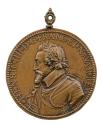 Bronze portrait medal of Henri IV with a laurel wreath, wearing ornately-decorated armor, a com…