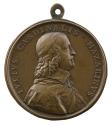 Bronze portrait medal of Cardinal Mazarin, hair long and wavy, wearing a calotte, a soft collar…