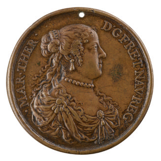 Bronze medal of a woman in profile to the right wearing a pearl necklace, pearl teardrop earrin…