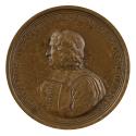 Bronze medal of man in profile to the left wearing magistrate’s robes