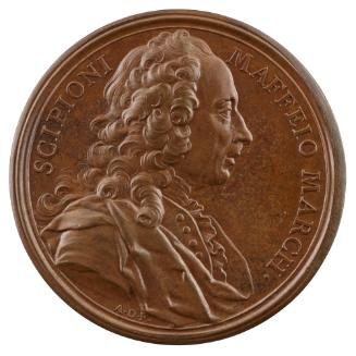 Bronze medal of a man in profile to the right