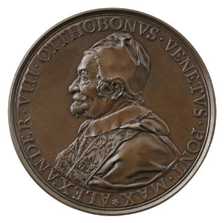 Bronze medal of a man in profile to the left wearing a fur-trimmed hat and robe