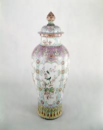 Very Tall Covered  porcelain Jar with blue, white, and violet decoration.